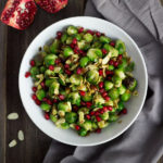 Roasted Brussels sprouts with toasted almonds are oven roasted Brussels sprouts with butter and maple syrup. Topped with toasted almonds and butter. The combination of the caramelized Brussels sprouts with the crunch of the toasted almonds is perfection. | www.butterandthings.com